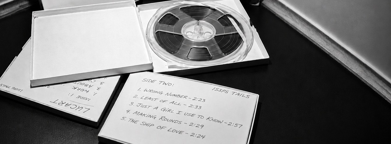 An open tape box and film reel from the LUCART archive